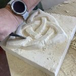 close-up of traditional stone carving