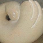 small deco-style curlew hand-carved from stone